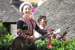 动听,朗朗上口的《快乐拉祜》就是由村里的拉祜族姑娘李娜倮倾情创作