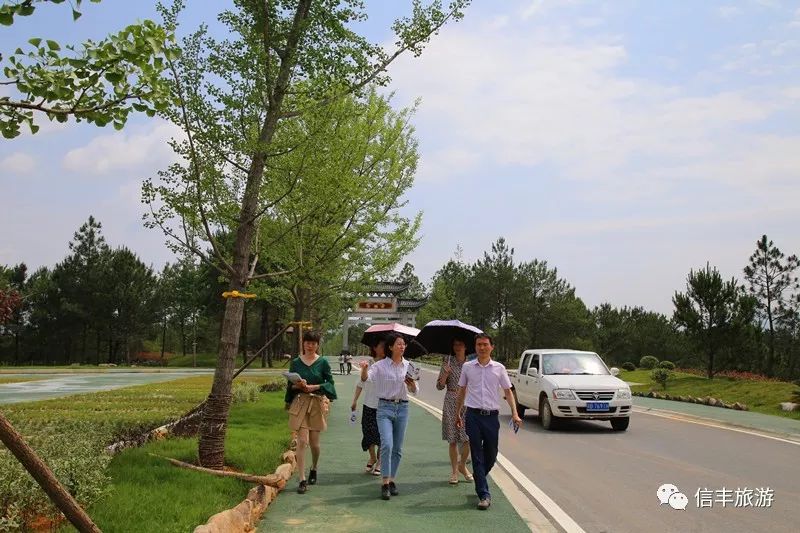 在安西田壠畲族村實地指導新田坪地山村