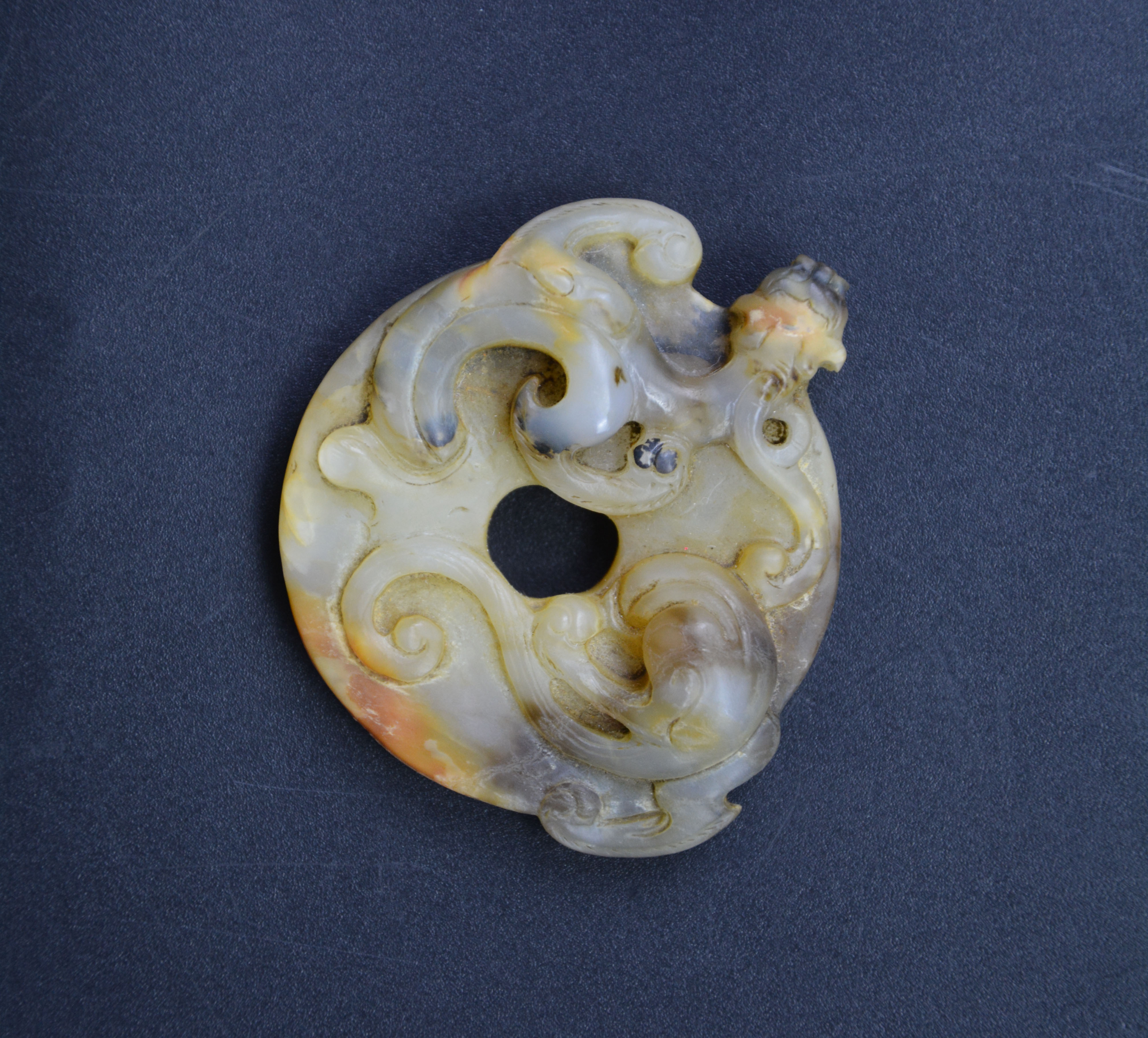 汉螭龙穿云出廓玉璧绵延五千年的艺术瑰宝