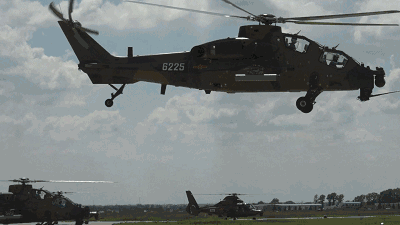 直升机迅速起飞飞赴目标空域七月中旬,空降兵某空中突击旅在驻训地