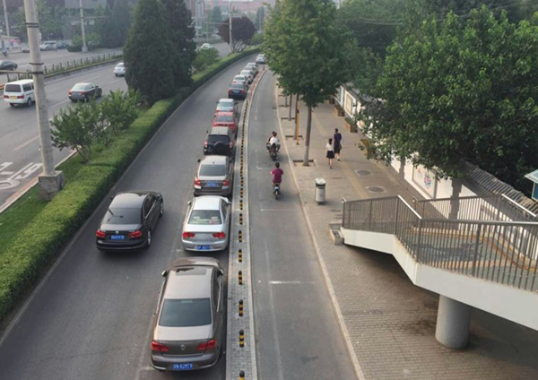 狹路相逢自行車道變成停車場北京的自行車如何迴歸城市