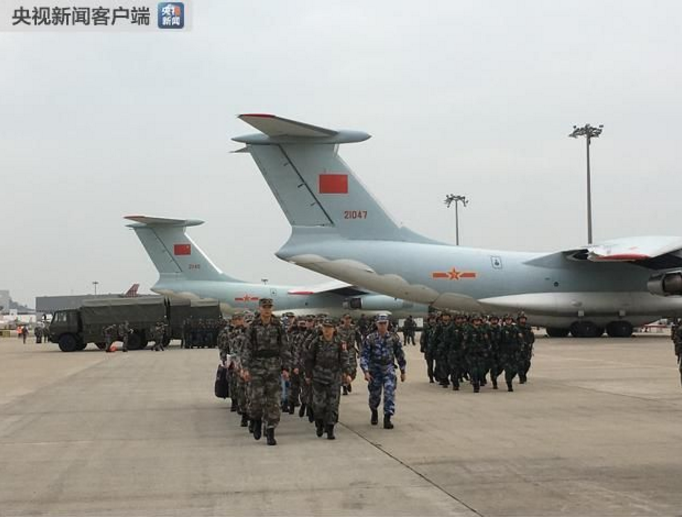 解放军空军首次从香港机场跨国接送兵力!