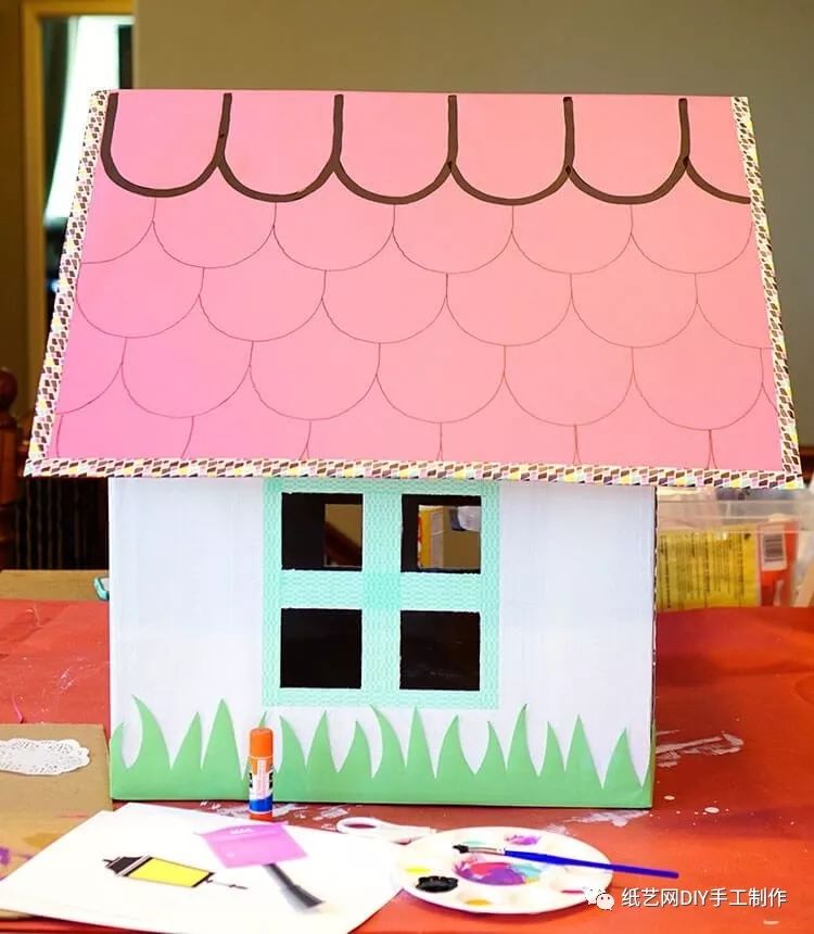 用纸箱给孩子做小房子图片