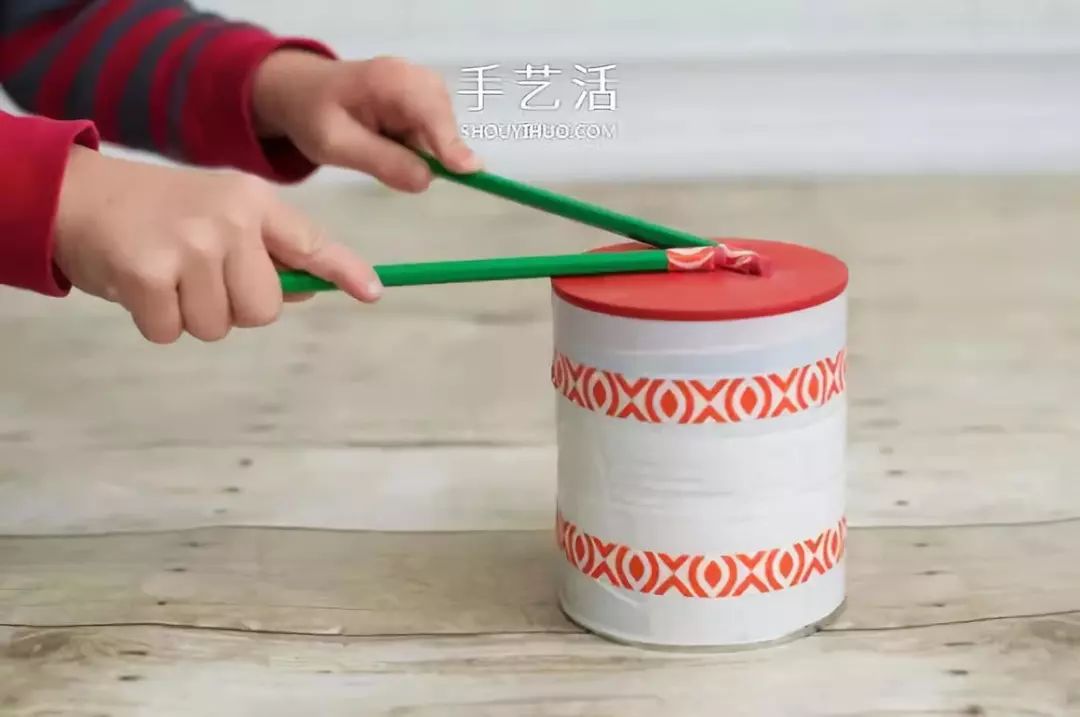 奶粉罐手工制作玩具鼓的方法教程