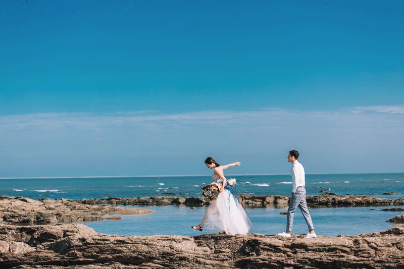 鄢陵鍾愛一生婚紗攝影0元拍青島日照海景,包吃包住包路費.