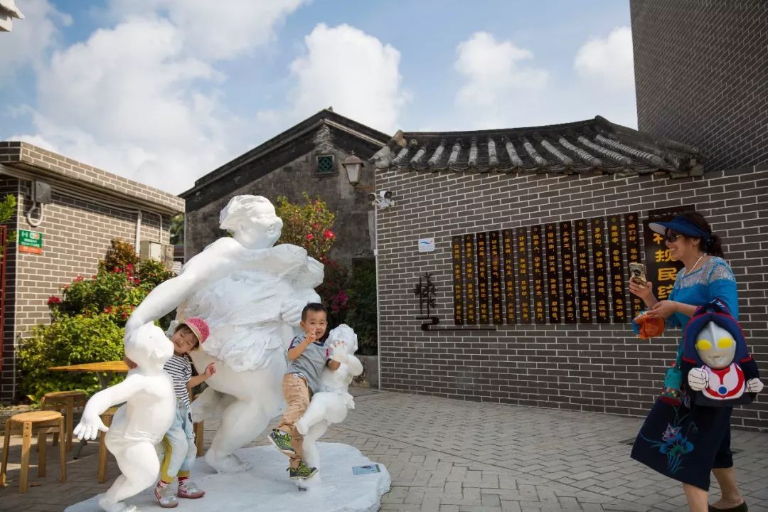 转载在博鳌网红南强村赏雕塑看花海享受海南春之阳光