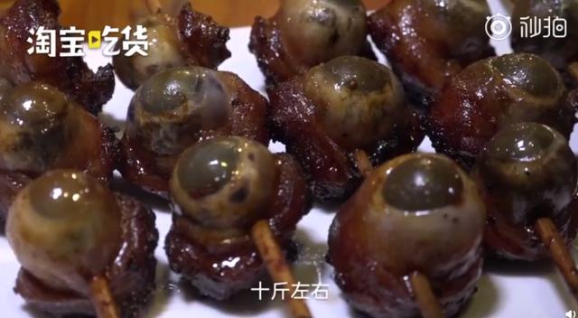 广西人又放大招爆浆烤猪眼一口咬开眼浆从嘴里喷出