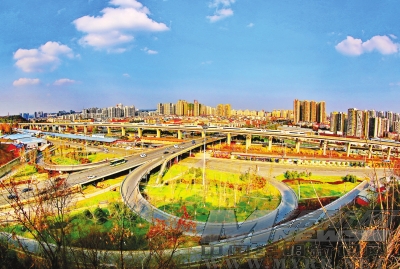 建设中的绵阳双碑大桥普明立交桥与普明相连,四通八达