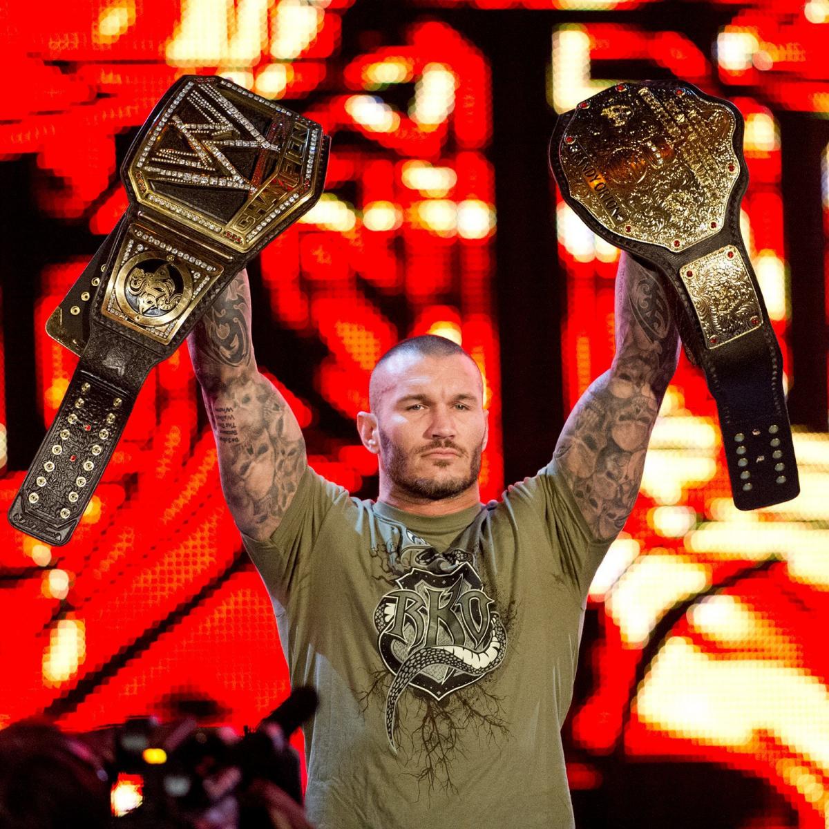 wwe史上首位毋庸置疑总冠军克里斯·杰里科,将wwf冠军与wcw世界重量级