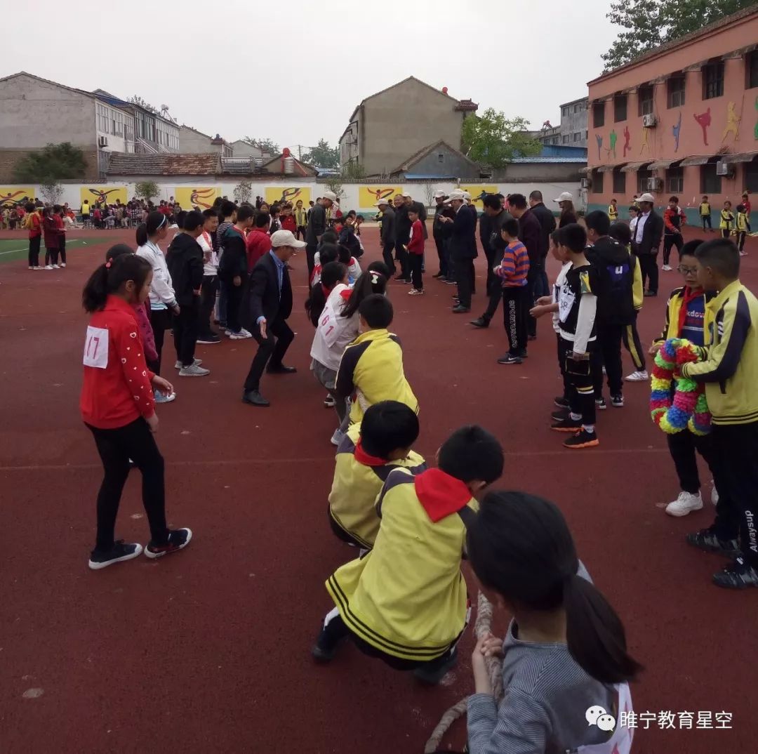 承奥运精神做阳光少年沙集镇中心小学举行2019年春季田径运动会