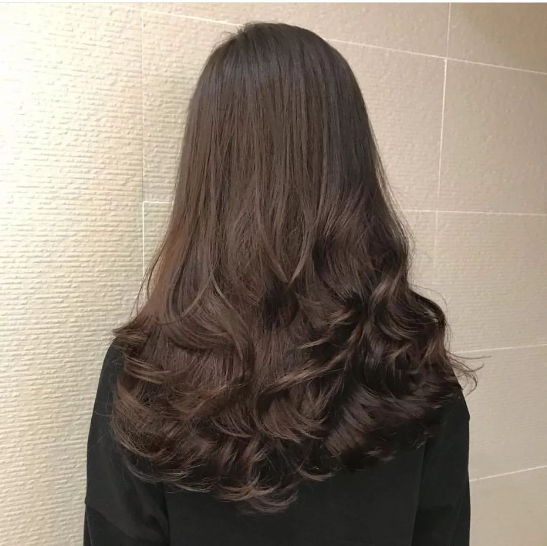 2019流行"烫半头"