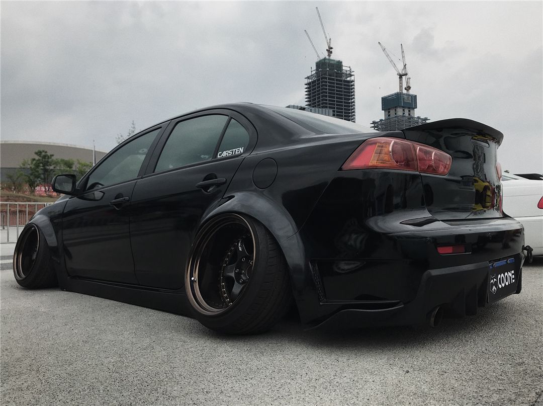 黑武士翼神,分辨翼神和evo的方法很简单,油箱盖!