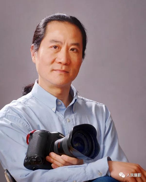 摄界达人朱建国为小萌贼拍图片故事