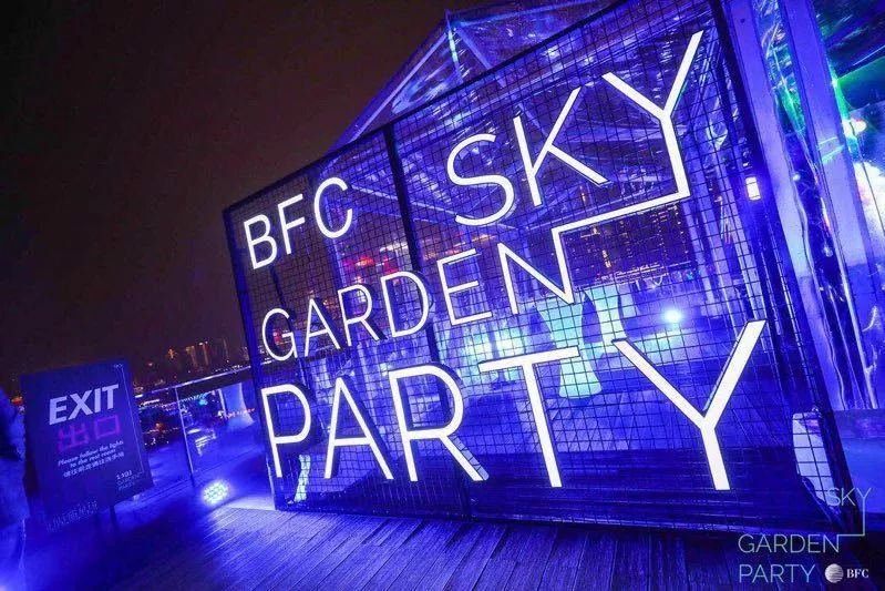 hands in the open-air at this awesome, outdoor rooftop party