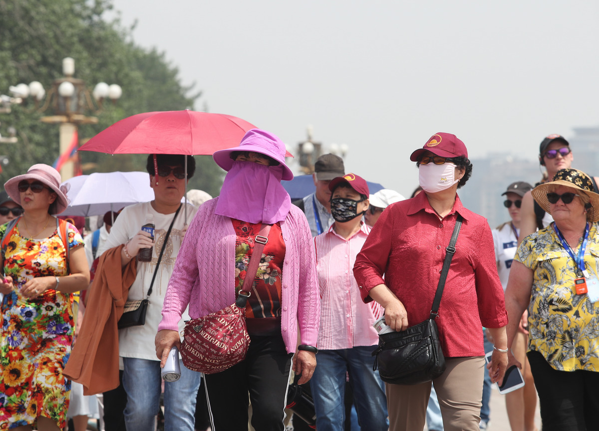 图虫人文摄影天安门游客遮阳防晒各有妙招