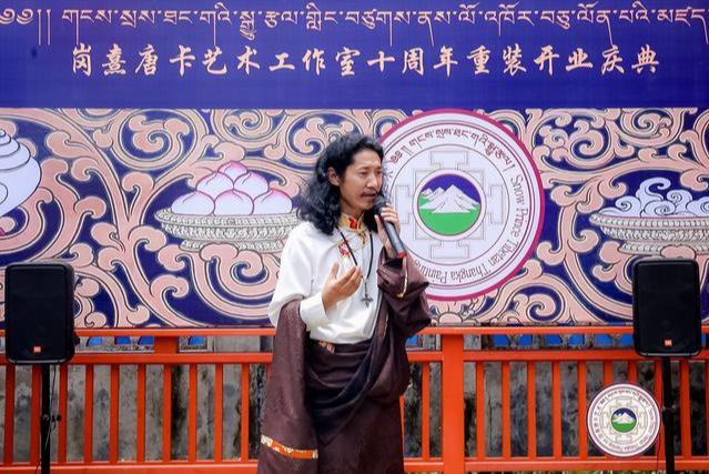 格桑扎西秉承唐卡传统并从艺术源头觉者的心为精神特质去铸造自己的