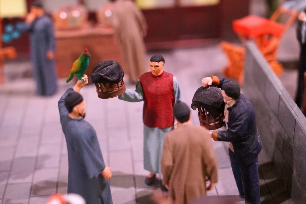 提笼架鸟曲艺表演,大鼓书耍猴的变戏法的打麻将的这是戏曲表演,说明上