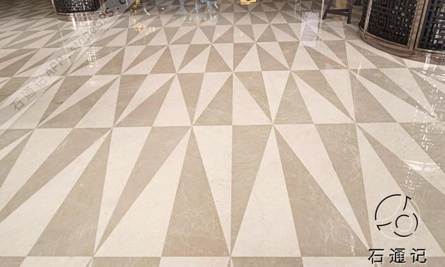 将石材切割成大小不同的三角形,平行四边形,再创意性地组合铺贴.