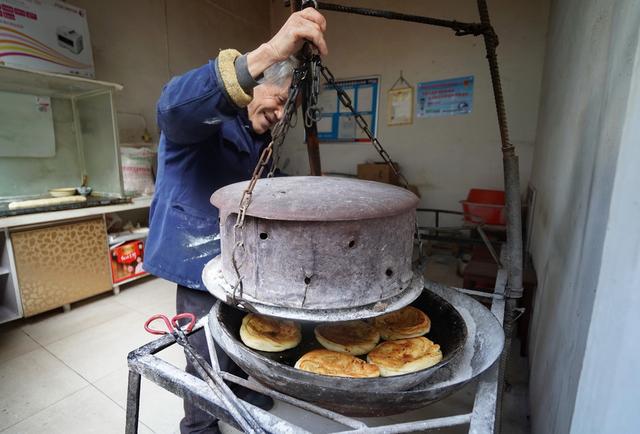 老式烤馍夹子图片