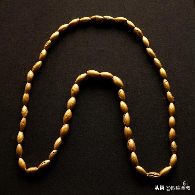 枣核形金珠串·四库全叔拍摄还有这种束腰的对称葫芦形状金珠,在膨出