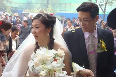 李莹是在天津医科大学当体育老师,李珊是天津市排球运动管理中心主任