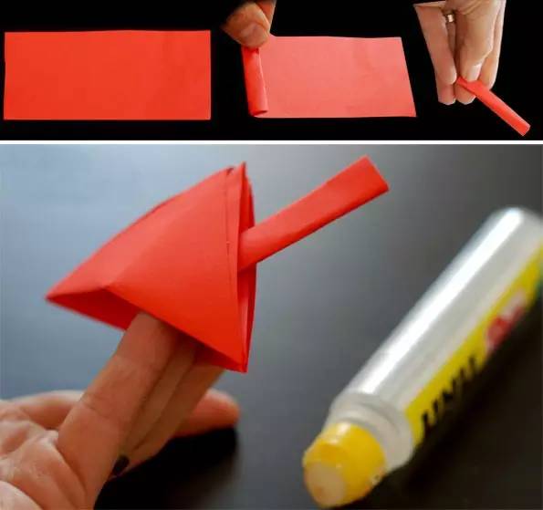 卷纸筒火箭筒准备材料:纸筒,装饰纸,不织布,白乳胶,剪刀制作步骤图