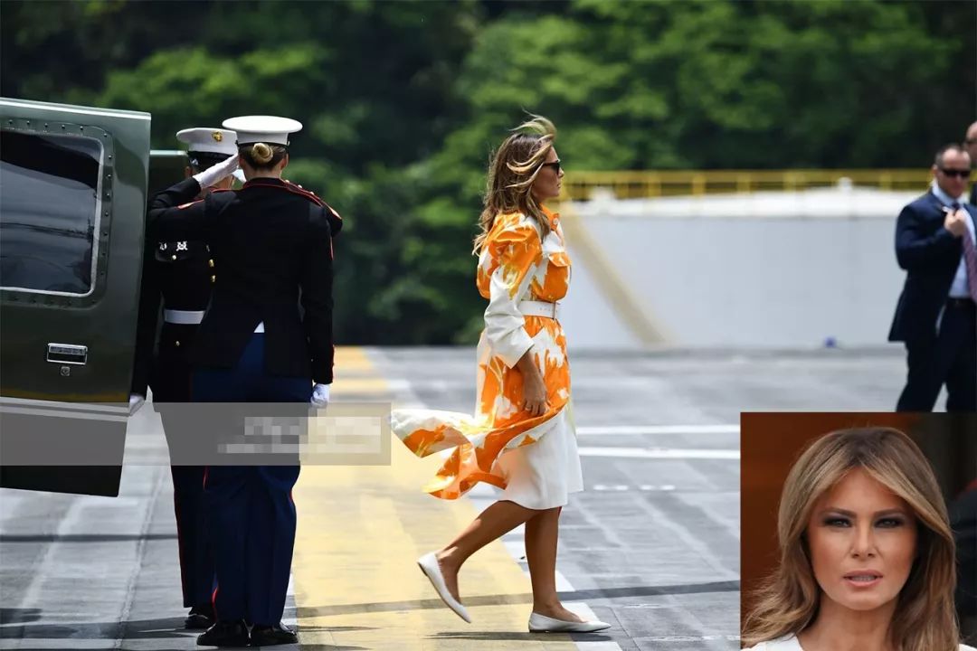 原创梅拉尼娅访问军舰!穿橘色风衣明亮大气,稳赢日本第一夫人绿裤子
