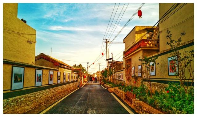 文化打造美丽乡村"——山亭区举办《李庄影像61影响》摄影展