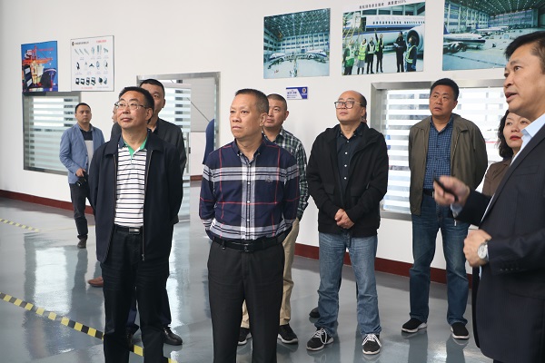 游仙区人大常委会主任袁玉国带队视察军民融合产业园建设情况