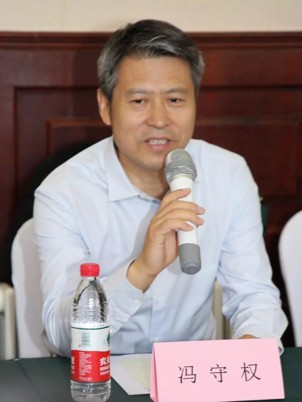 市服装行业协会副会长兼秘书长孙金海,大连市服装纺织协会会长刘向阳