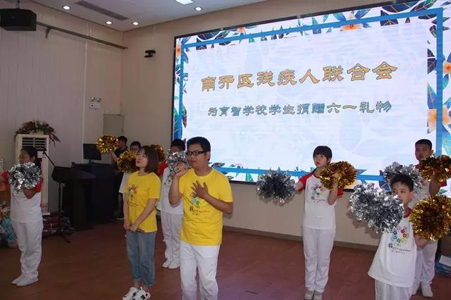 民革南开区委会,天津市少儿图书馆及我区爱心企业走进南开区育智学校