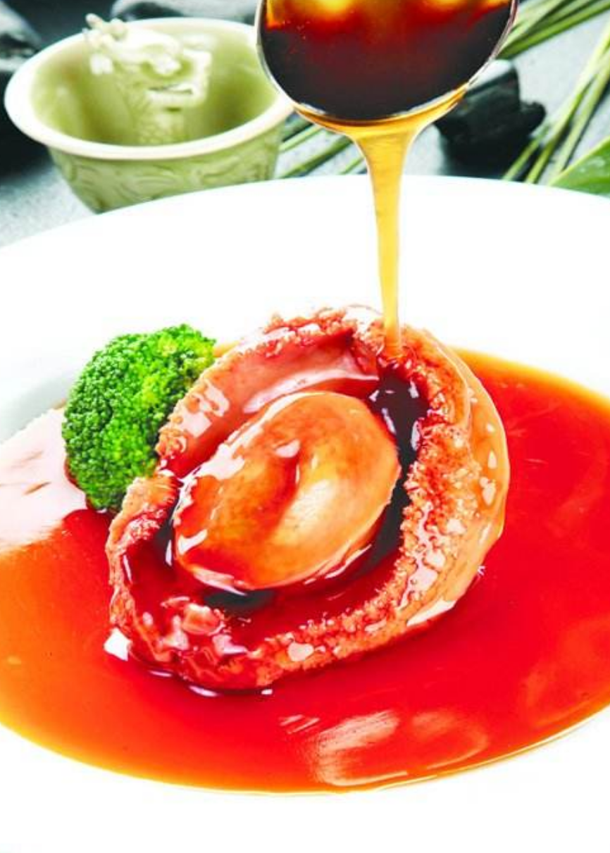 一份肥美的浇汁鲍鱼但你享受世间最大的美味