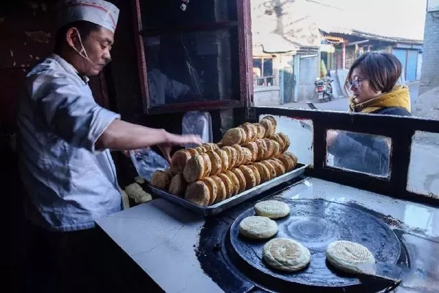 孝义火烧每一口充满回味的咀嚼都有古老传说的记忆