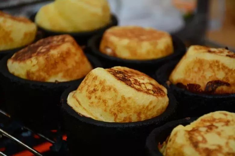 唯有美食不可辜负金色芒果火热元江午餐主食:长街宴·特色美食一条街