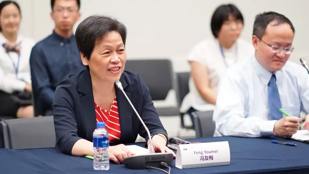 财科技股份有限公司董事长朱烨东,总裁沈飒与昆山杜克大学校长冯友梅