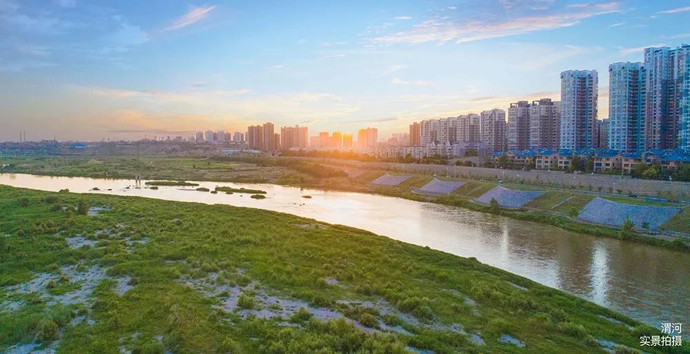 渭河实景图项目西侧,约500米处,则是泾渭体育运动公园,大面积城 