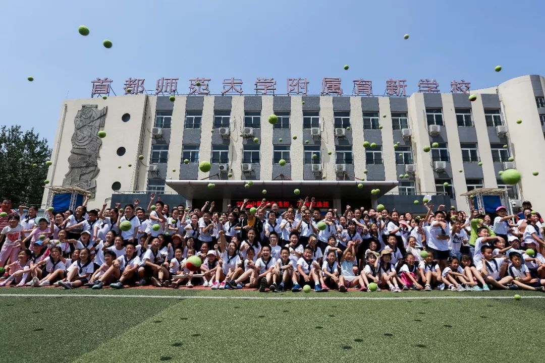 中国人寿中网球童暨中网小画家选拔走进育新学校