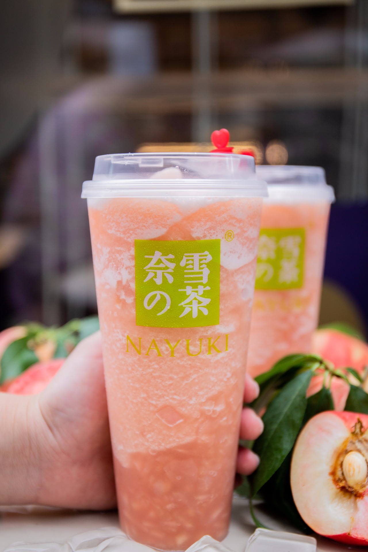 奈雪蜜桃茶梦幻回归!还带来了重庆第②家春镜店,圆你桃粉色的仲夏梦!