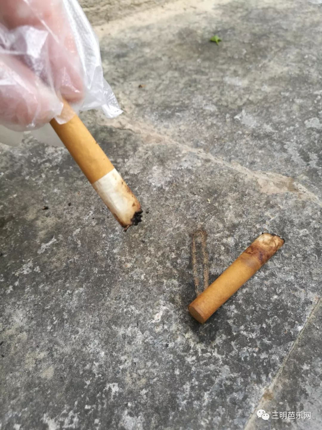 历时2个小时我们在三明街头捡了751个烟头