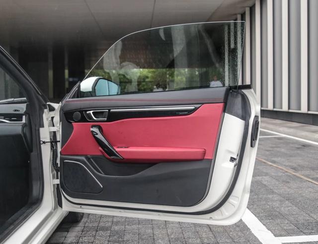 国产高颜值电动轿跑配无框车门69s破百12万买它值不值