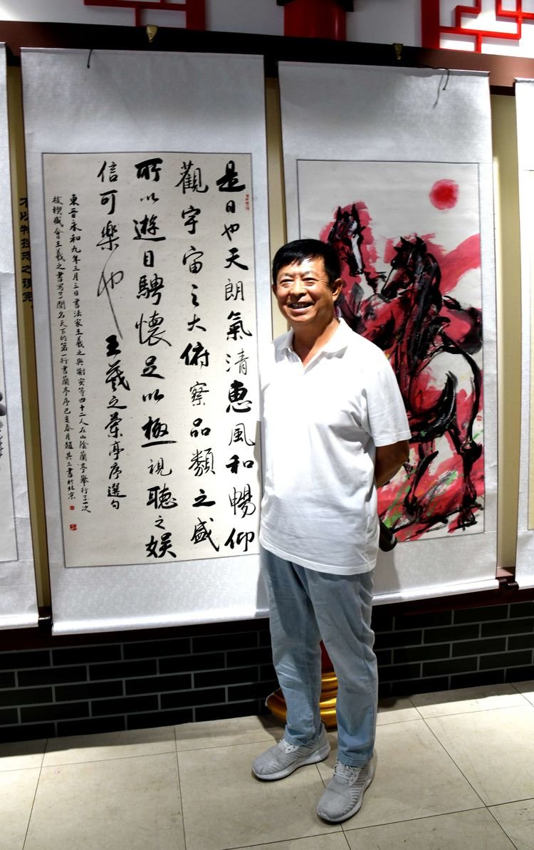 歌巨变 丹青颂辉煌"庆祝中华人民共和国成立70周年书画展,通过书法