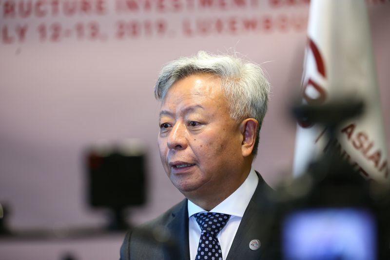 金立群:亚投行成员"破百"是国际社会投下的信任票_中国