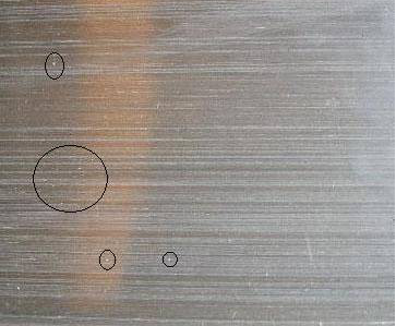 特征:较轻时用手能抹掉,毛刺严重情况下紧粘附在制品表面,会产生小划