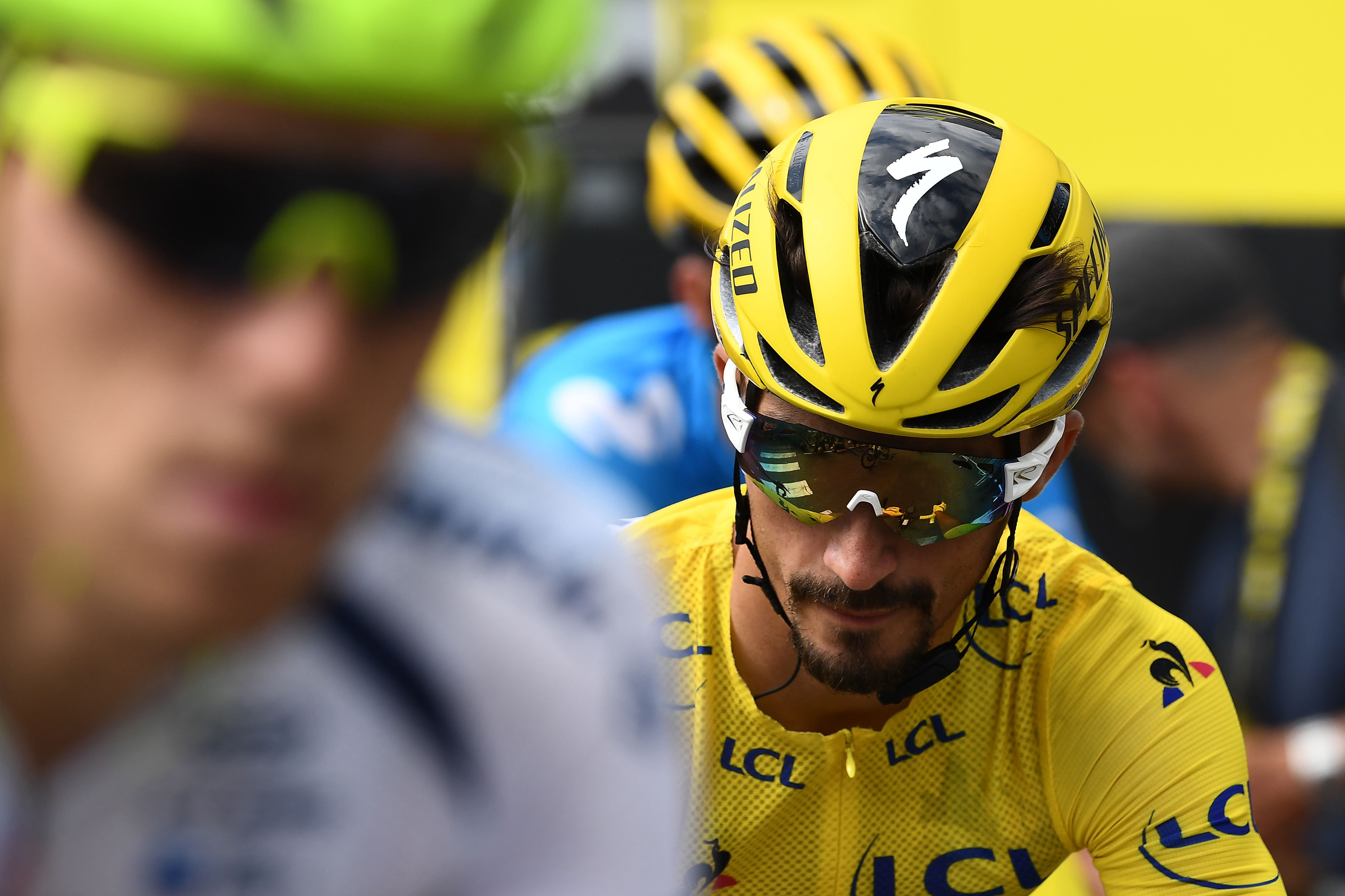 7月18日,获得黄色领骑衫的法国车手阿拉菲利普在比赛中.