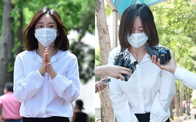 原创被判刑后的黄荷娜一身白衣亮相街头面对镜头羞愧捂脸