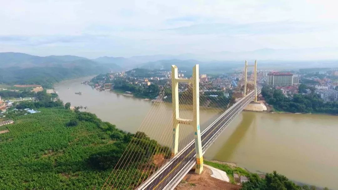 摆渡成历史景洪市橄榄坝大桥22日试通车