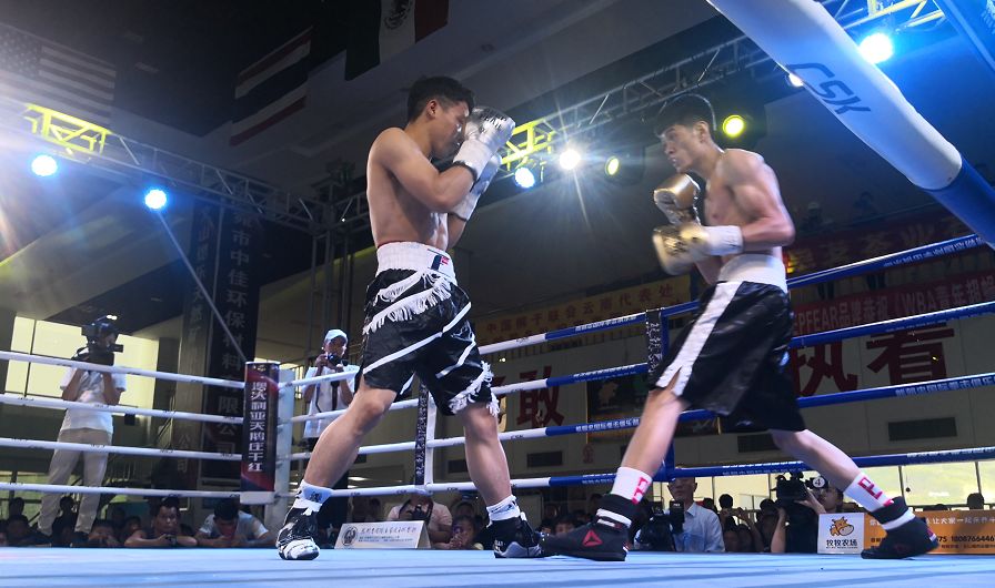 熊朝忠拳击俱乐部再传喜讯王德康荣获wba世界青年金腰带