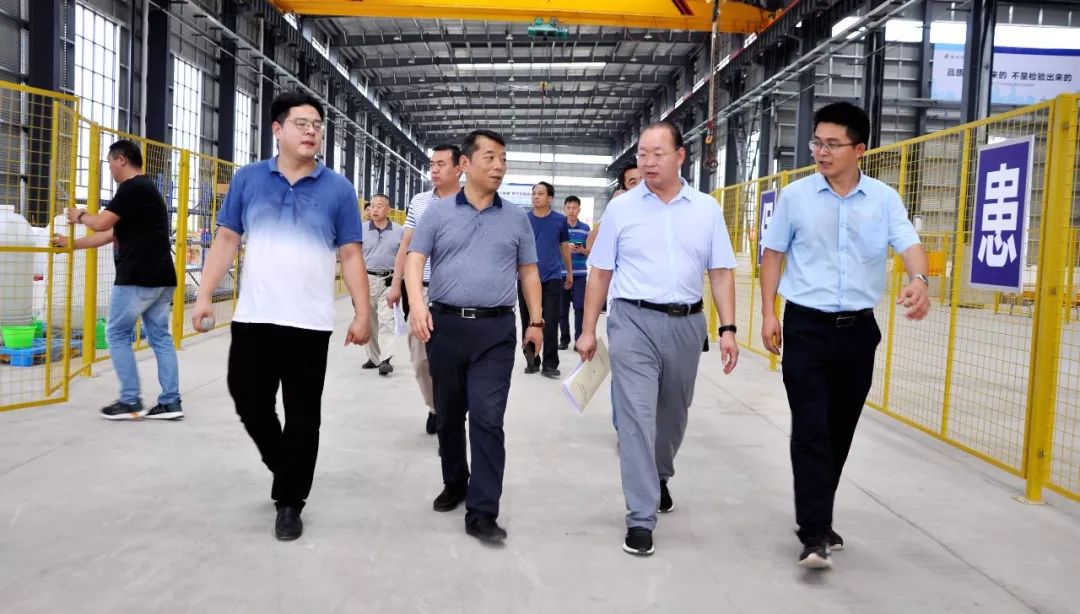 项目建设推进现场会召开_朱晓伟