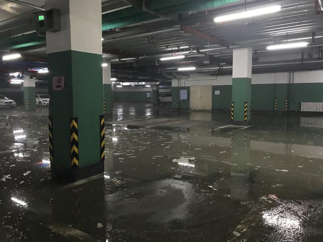 哈尔滨爱达九溪地下车库积水严重物业没交接
