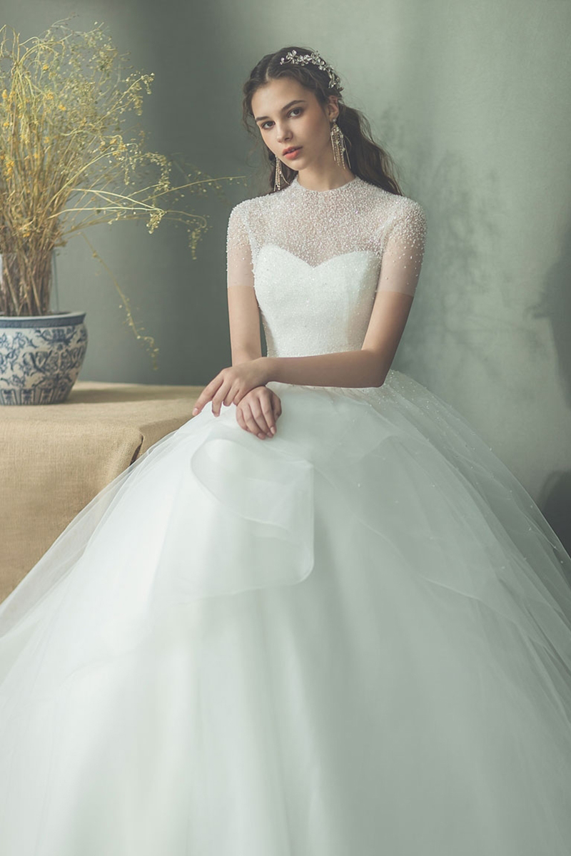 低调华丽的精致艺术:18件优雅时尚女神系婚纱_礼服